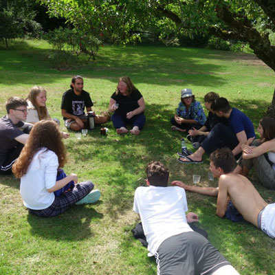 Group in circle outside